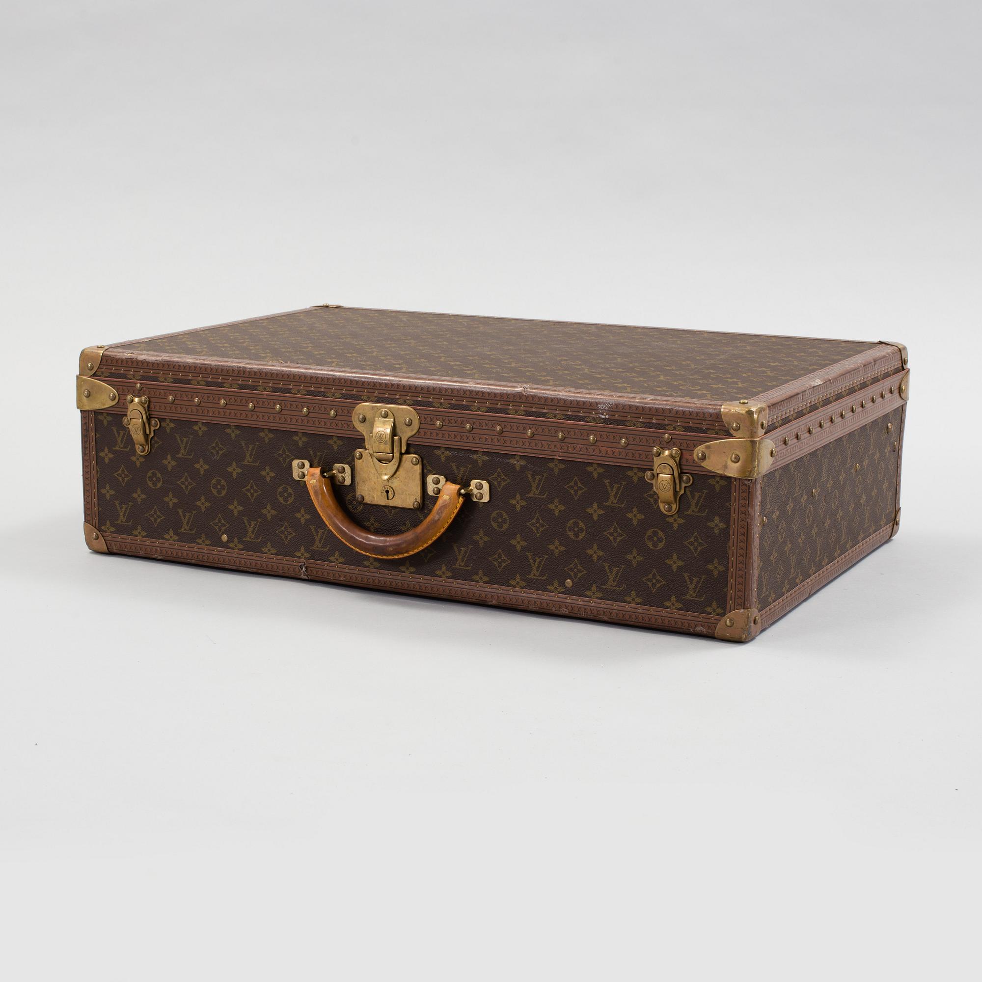 LOUIS VUITTON, a monogram canvas suitcase, "Alzer 75".