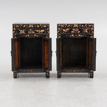 A pair of bedside tables/cabinets, China, 20th century.