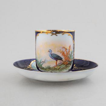 A set of nine porcelain coffee cups with saucers, Kuznetsov, Russia (1891-1917).