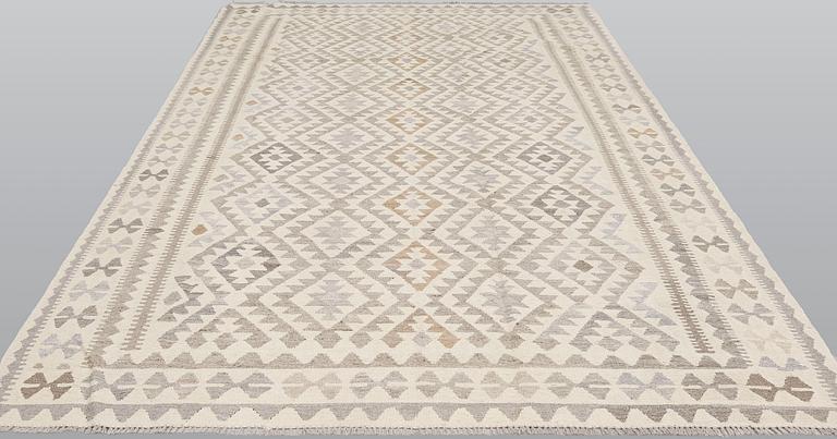 A Kilim carpet, c. 300 x 198 cm.