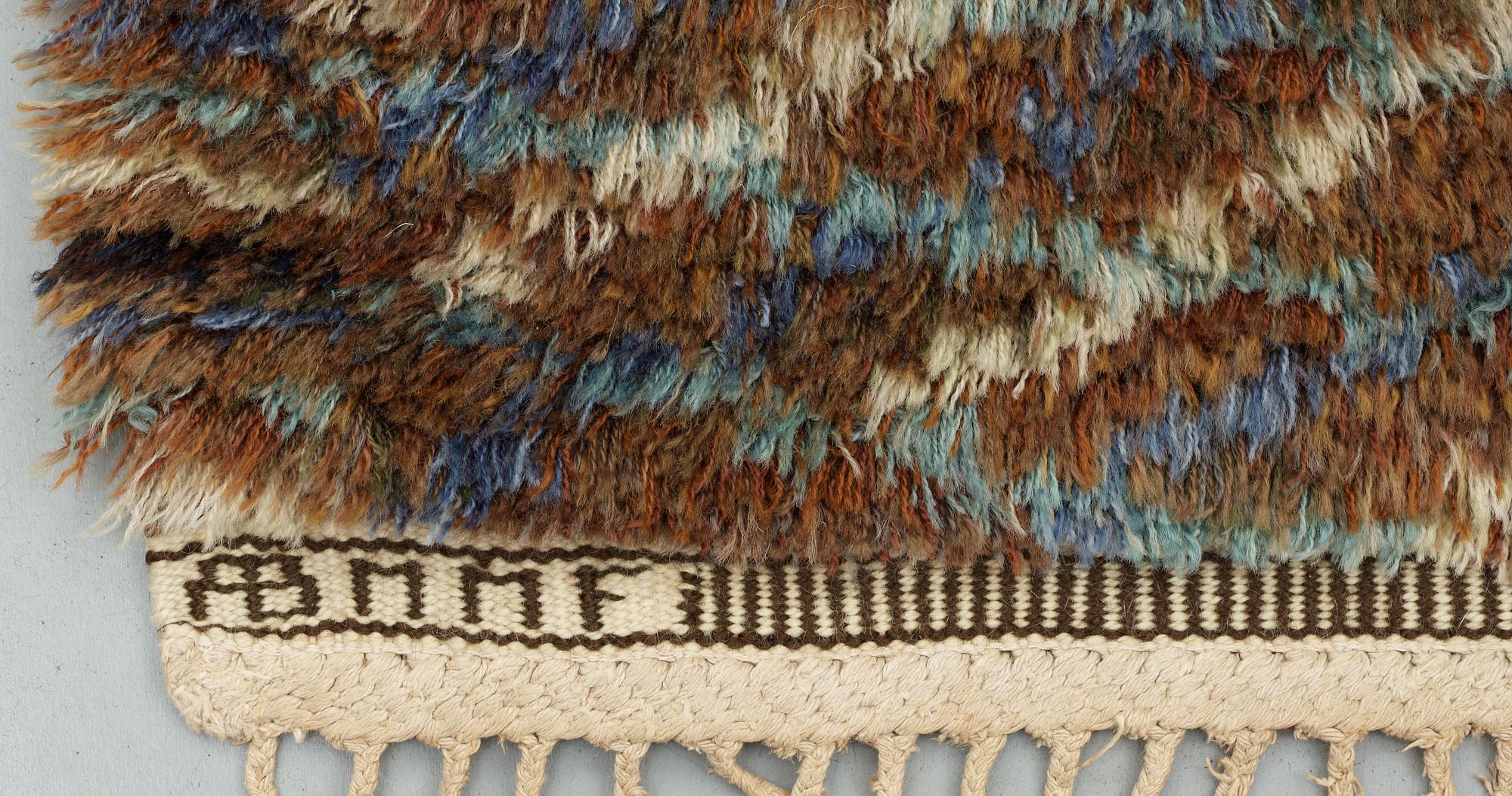 CARPET. "Marina brun". Rya (knotted pile). 242,5 x 167 cm. Signerad AB MMF BN.