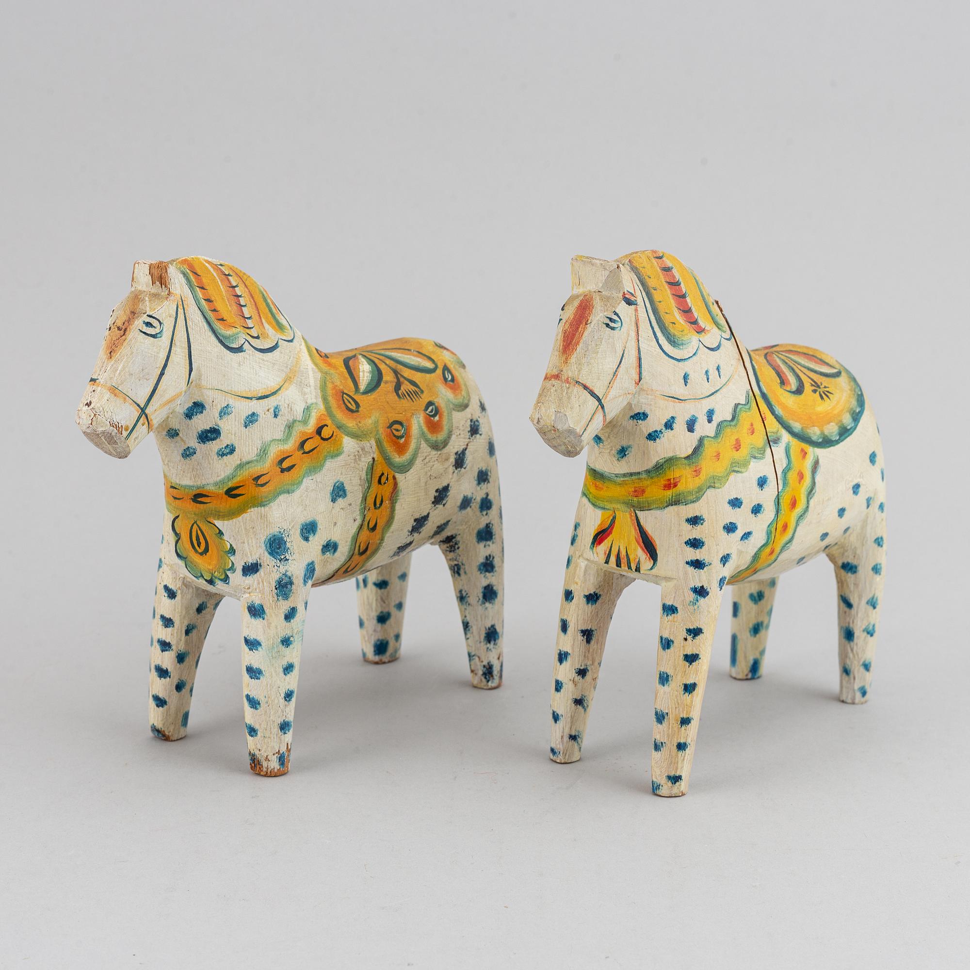 Two 20th century painted wooden horses.