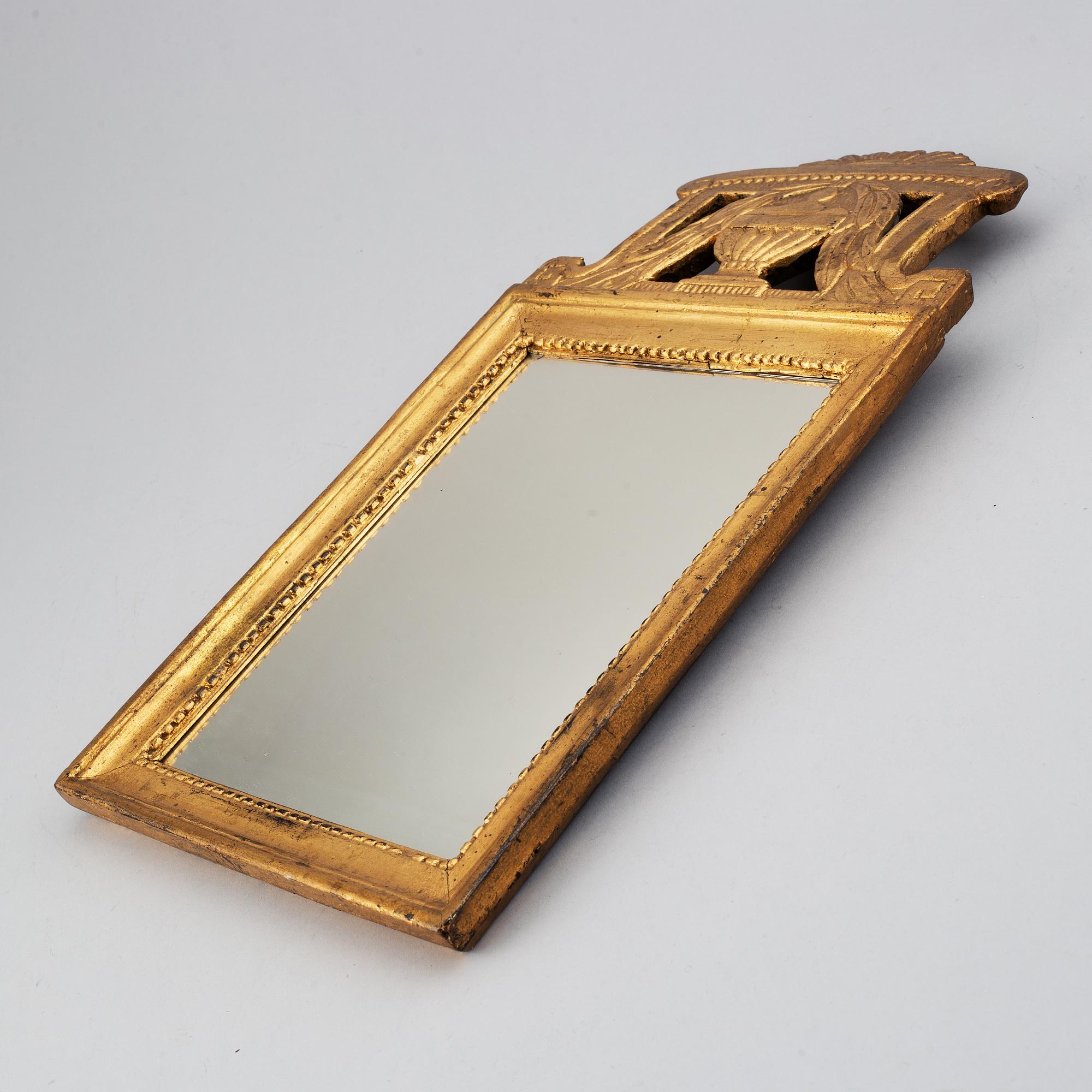 A Swedish 18th century gilt wood mirror.