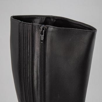 CHRISTIAN LOUBOUTIN, a pair of leather boots, size 37.