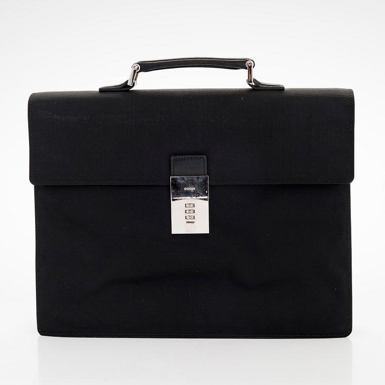 Gucci, laptop case/ bag.