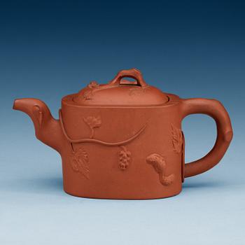 A Yixing tea pot with cover, 20th Century.