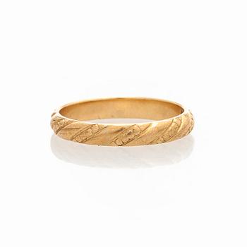 Kalevala Koru, ring "Halikon Lampolan kierresormus", 18K guld, Helsingfors 1998.
