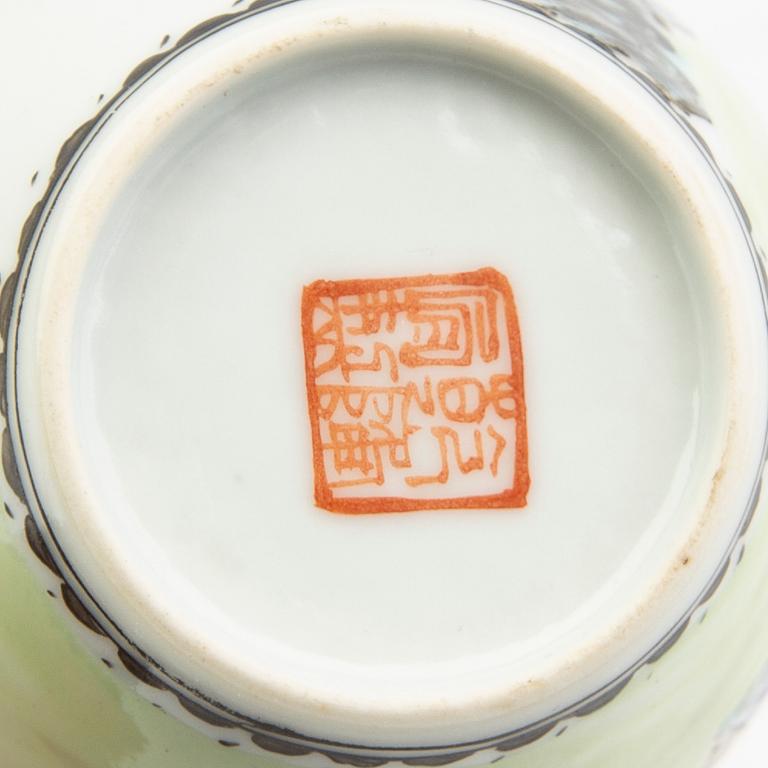 A Chinese 20th century Yixing ware tea service and a porcelain tea caddie.