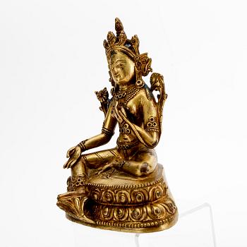 A Tibetochinese patinated bronze Tara figurine 20th century.