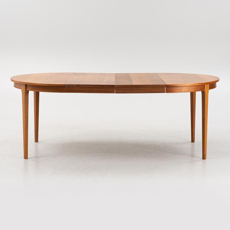 A walnut dining table from Linden, 1960s.