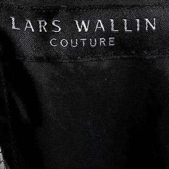 LARS WALLIN, a black and white dress.