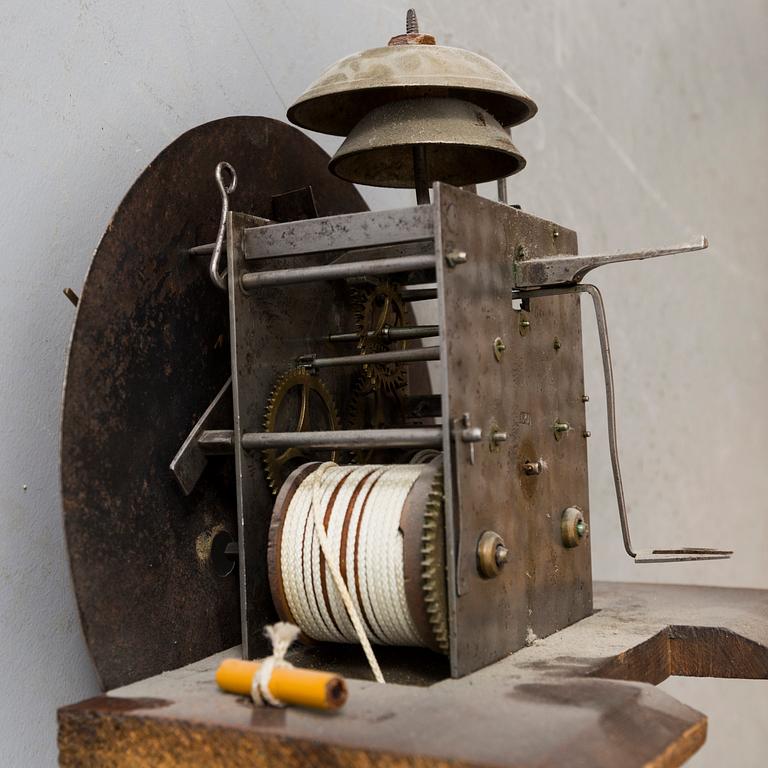 A 19th century wall clock.