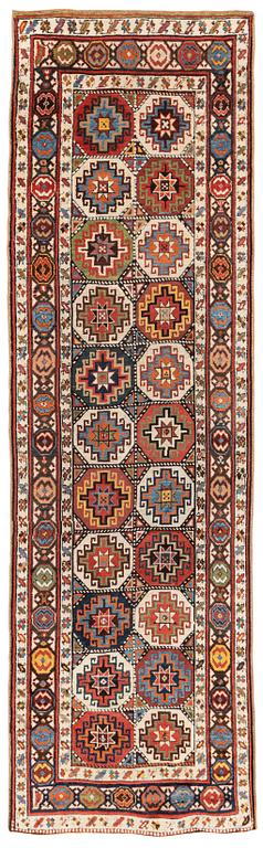 An antique Moghan 'Long rug', Kazak region South Caucasus, ca 360 x 106,5 cm.