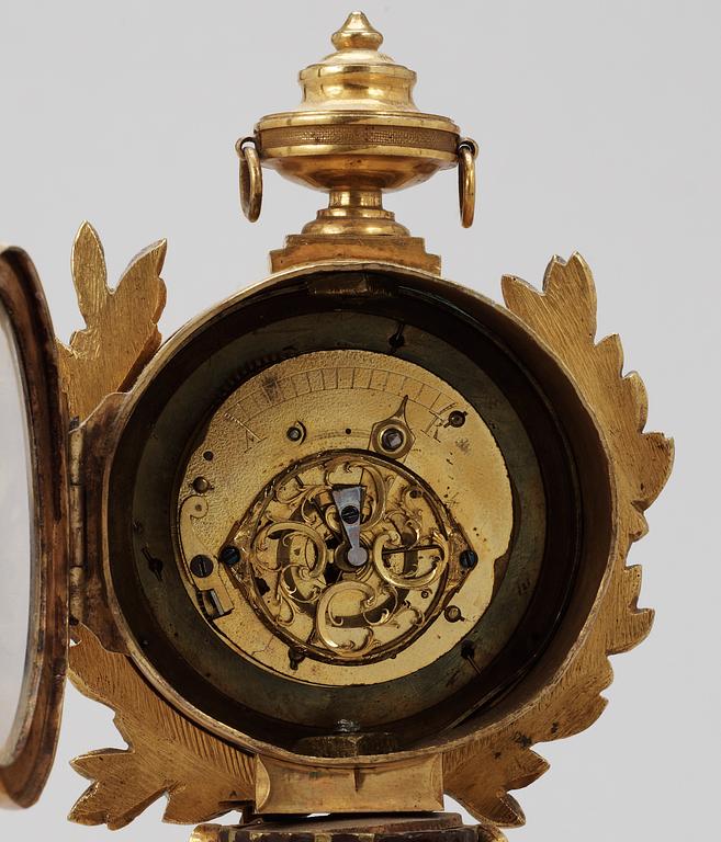 A Louis XVI 18th Century miniature table clock, dial marked "LE ROY A PARIS".