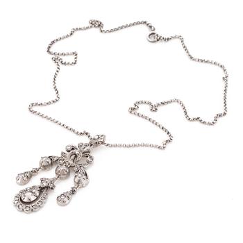 A silver chain and pendant set with rose-cut diamonds.