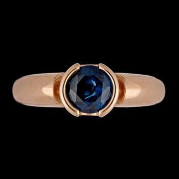 140. A blue sapphire ring.