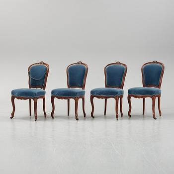 A sofa and a set of four chairs, Rococo revival, late 19th century.