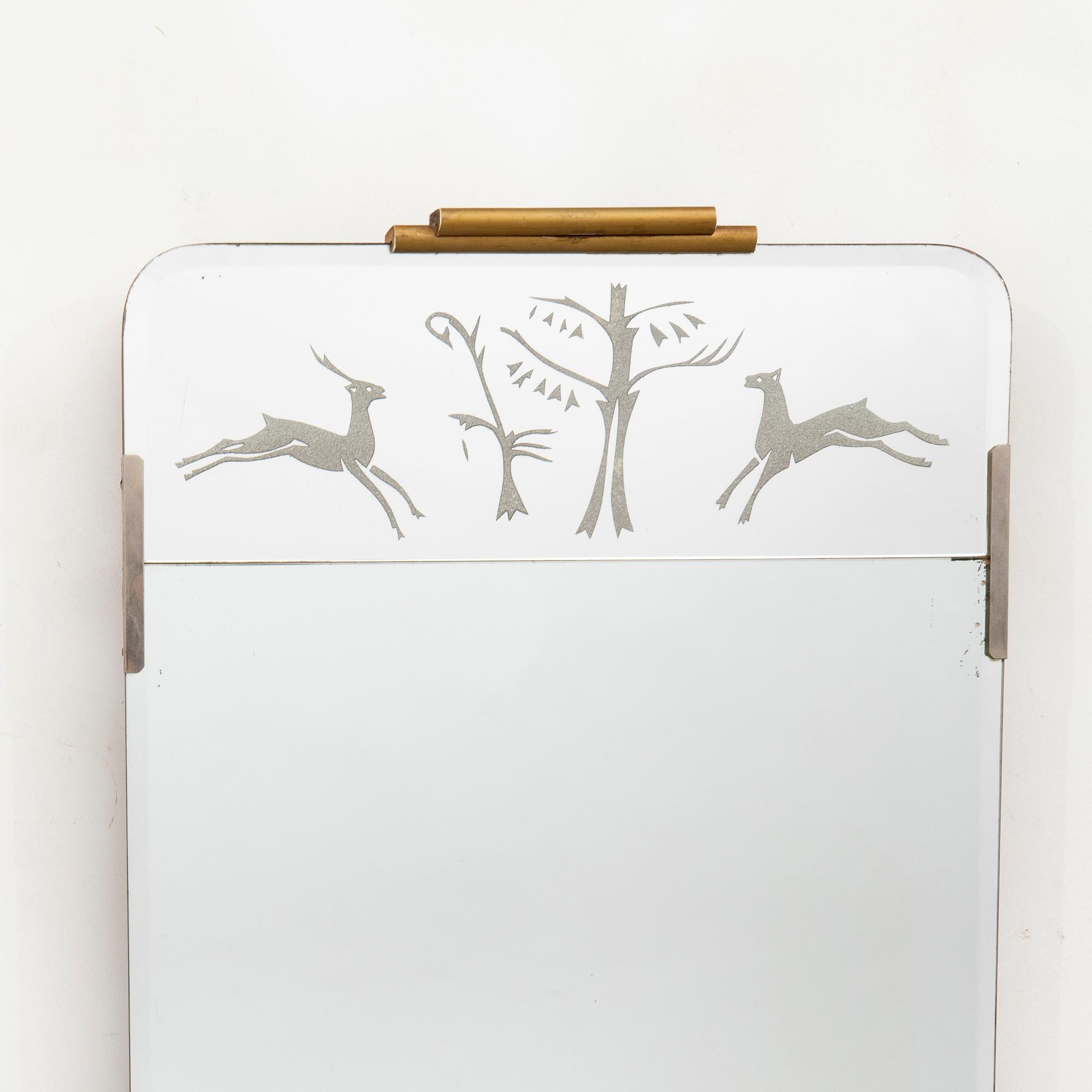 A 1940s Swedish Modern mirror.