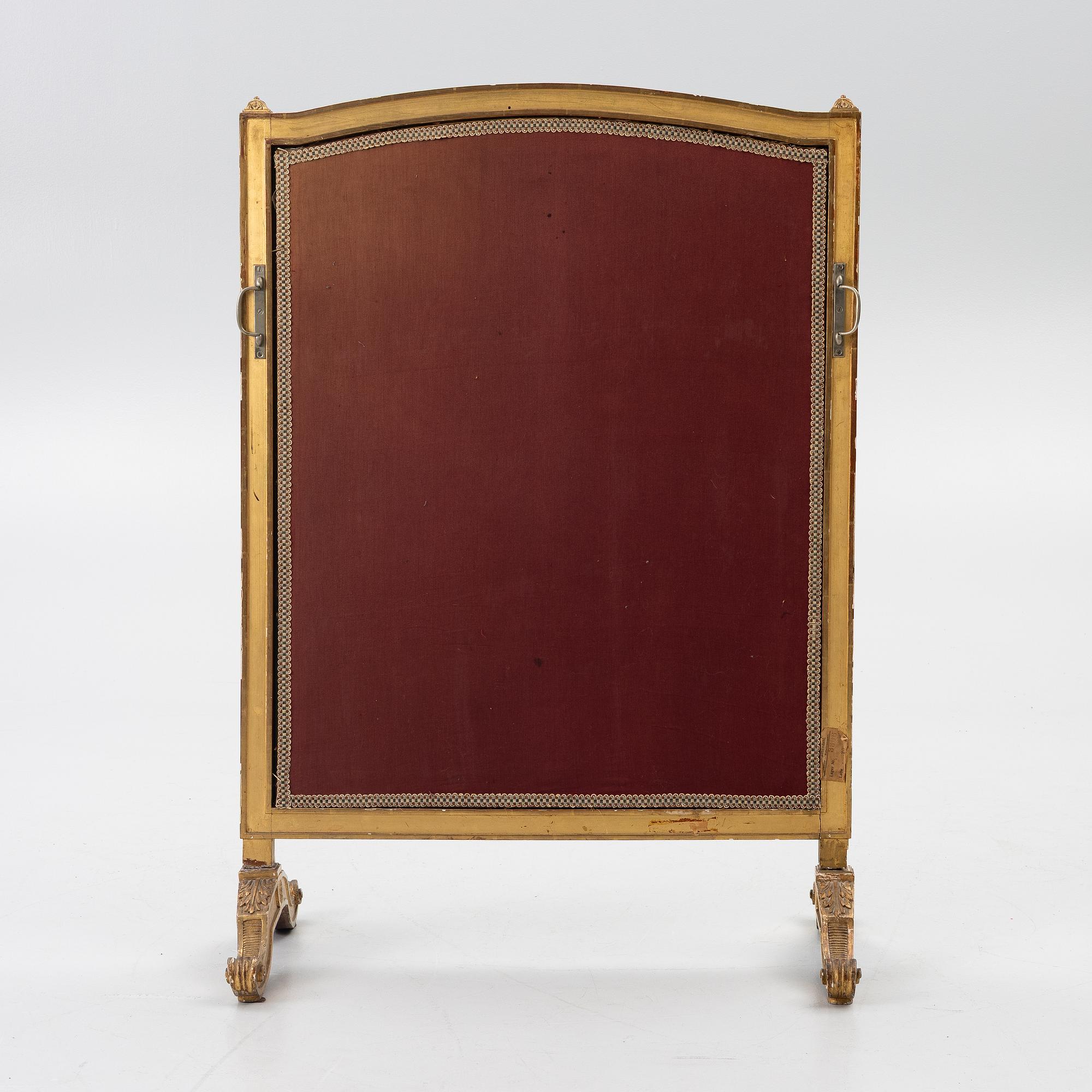 A Louix XVI-style fire guard, late 19th century.