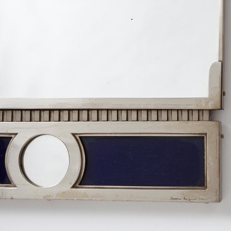 A Swedish Grace white metal framed mirror by Herman Bergman, Stockholm 1920-30's.