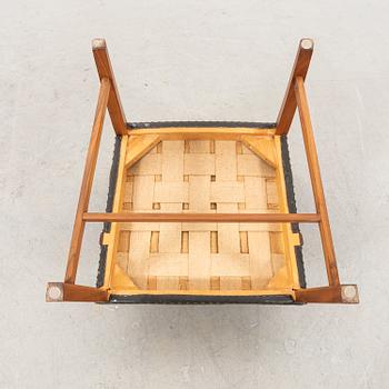 Karl Erik Ekselius, a teak and leather armchair.