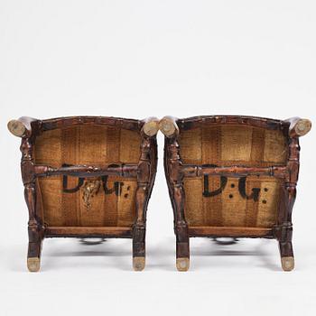 A pair of late baroque faux bois-painted chairs, attributed to M. Meling, 1730/40's.