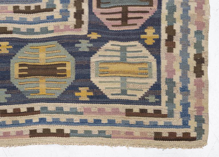 Märta Måås-Fjetterström, a carpet, "Dukater", flat weave c 356 x 303 cm, signed MMF.