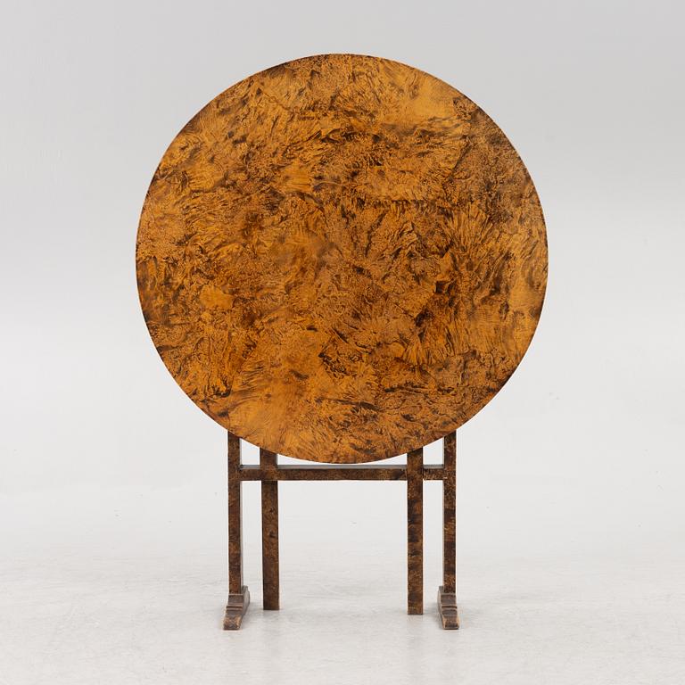 A folding table, 19th Century.