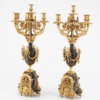 A pair of bronze candelabra, late 19th Century.