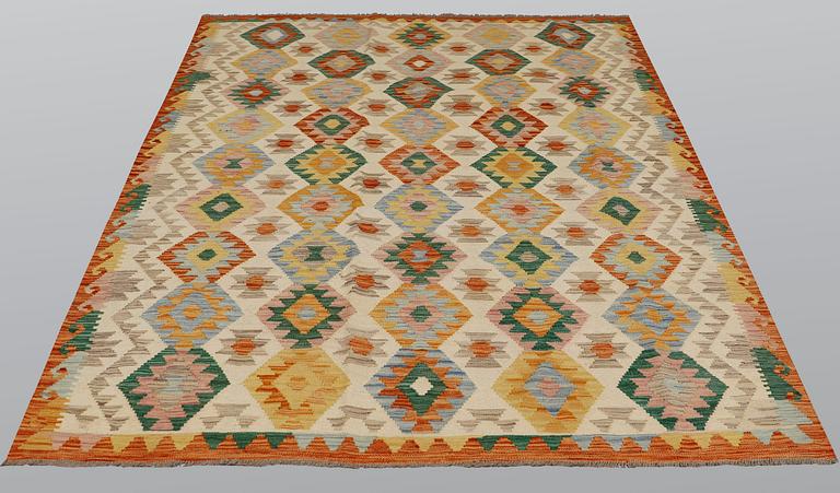 A carpet, kilim, ca 247 x 180 cm.