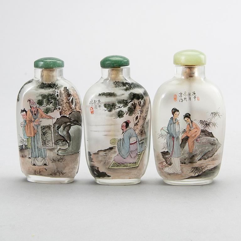 A set of nine Chinese glass snuffbottles, later part of the 20th century.