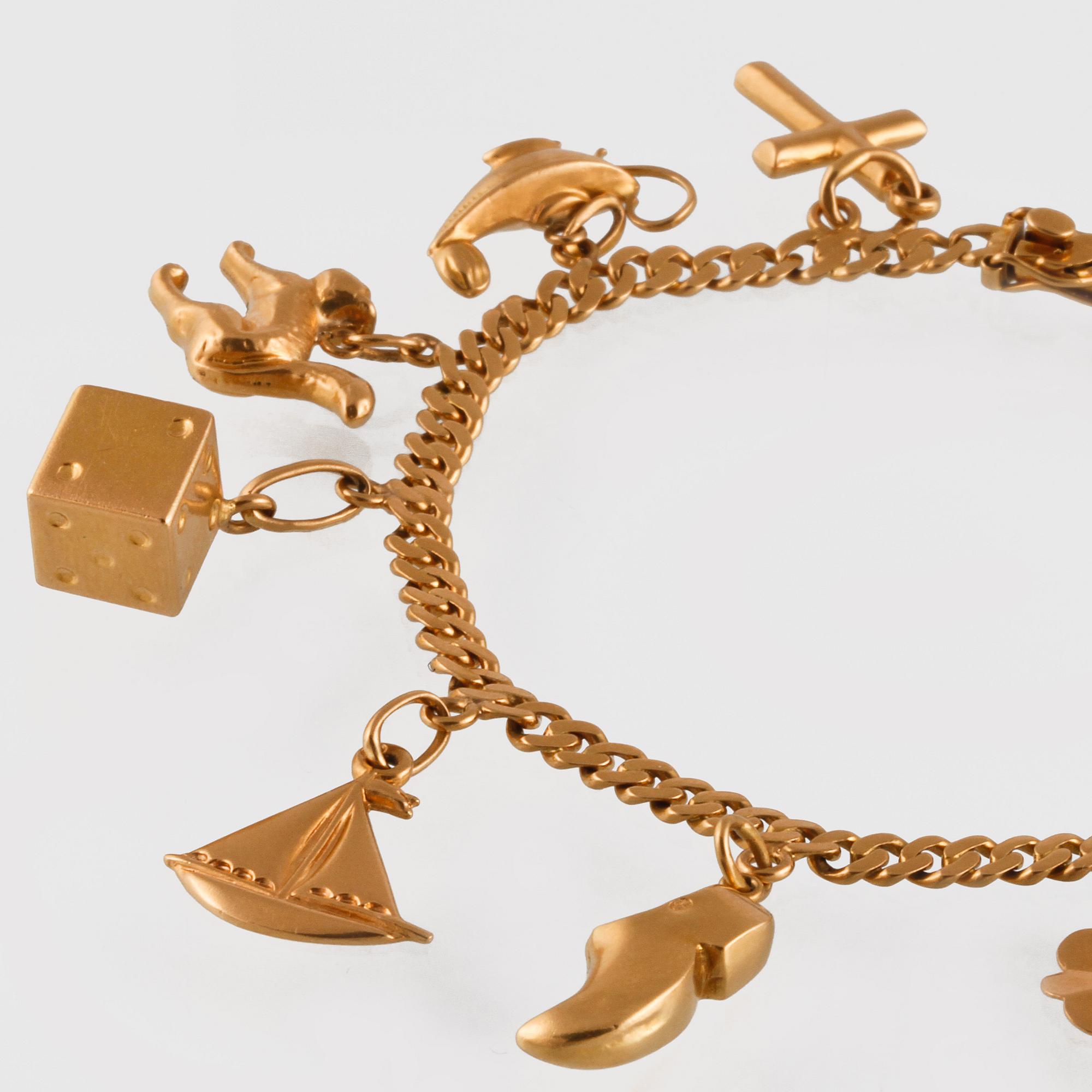 BERLOCKARMBAND,18K guld, importstämplad. Vikt  16,5 gram.