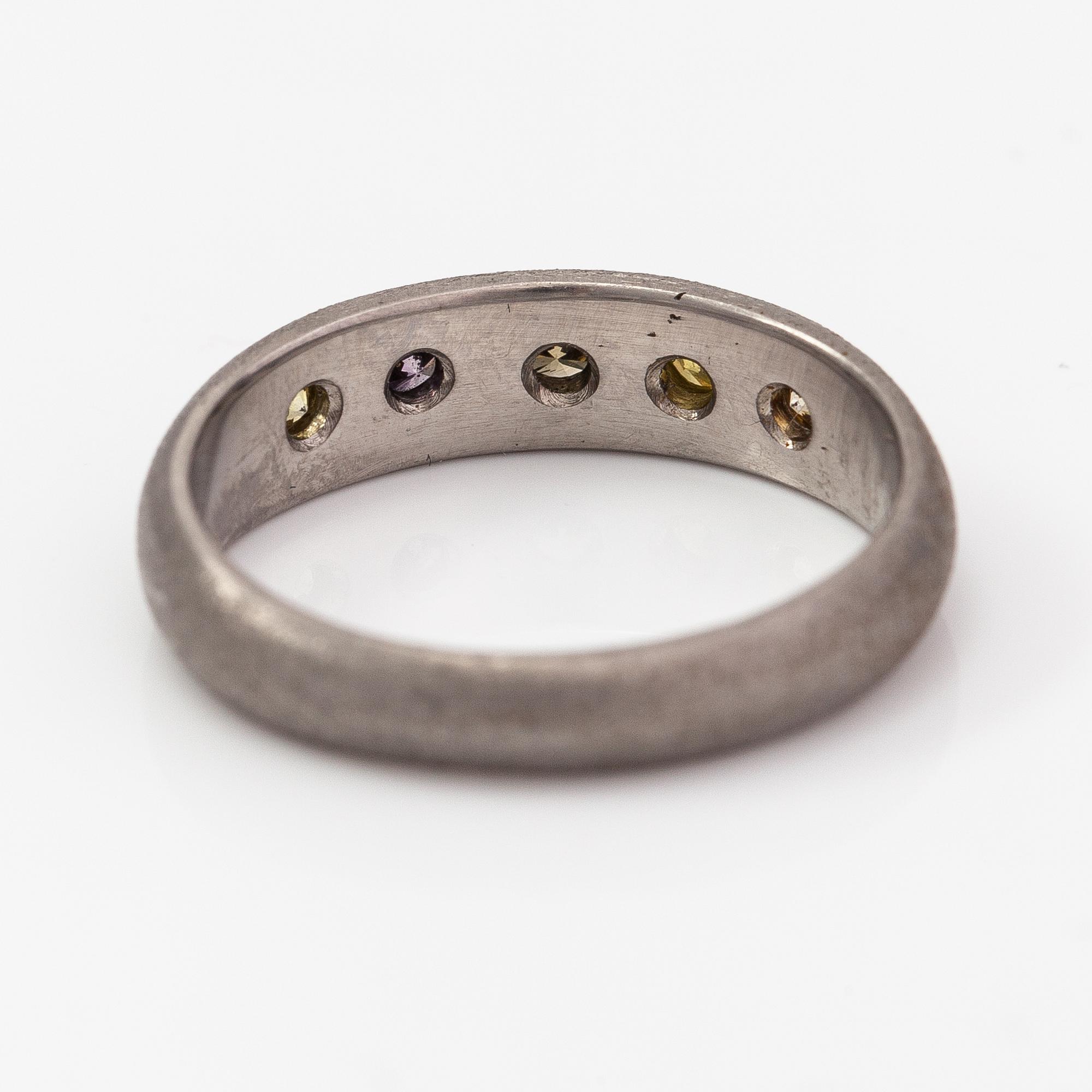 A palladium ring with diamonds ca. 0.25 ct in total.