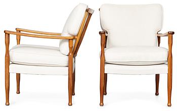 A pair of Josef Frank mahogany easy chairs, Firma Svenskt Tenn.