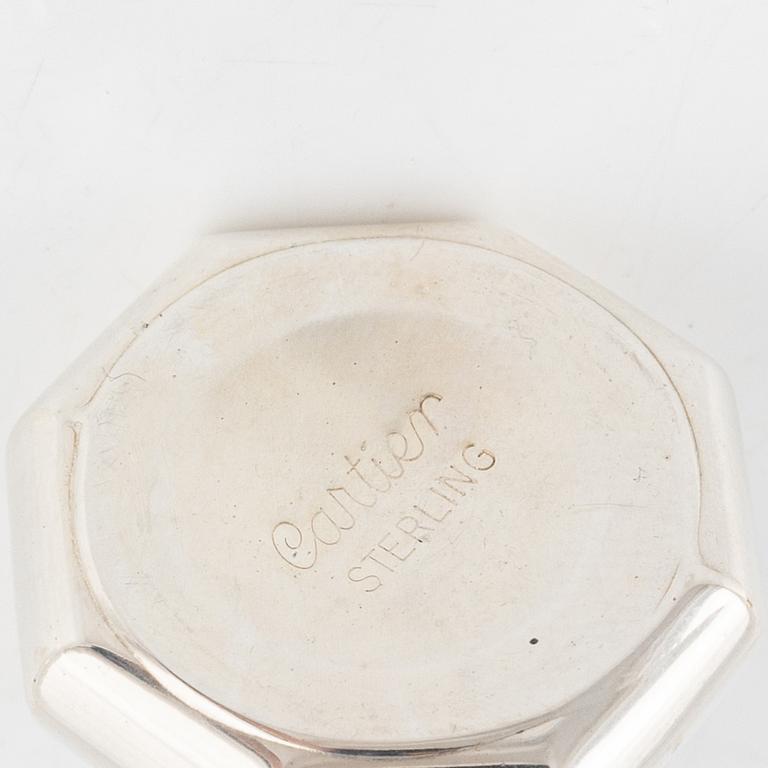 Cartier, eight sterling silver salt- and pepper shakers with case.