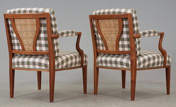 A pair of Josef Frank mahogany armchairs, Svenskt Tenn, model 969.