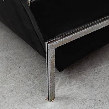 A 1960's leather covered sofa.