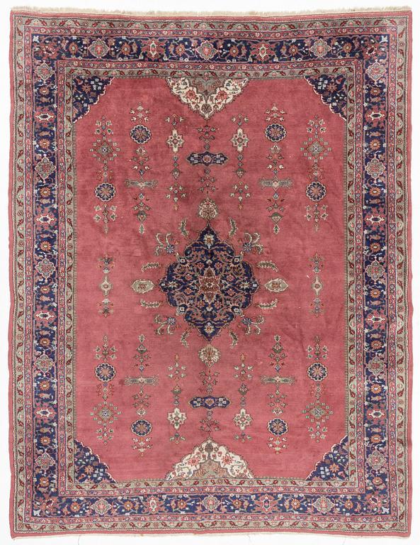 An oriental/eastern European carpet, c. 355 x 275 cm.