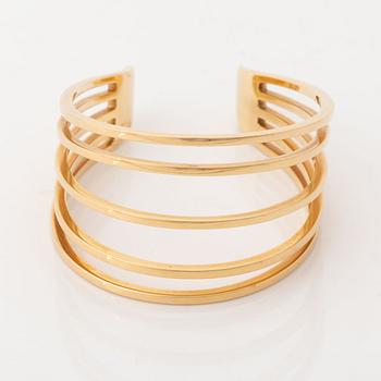 An 18K gold Sigurd Persson bracelet.