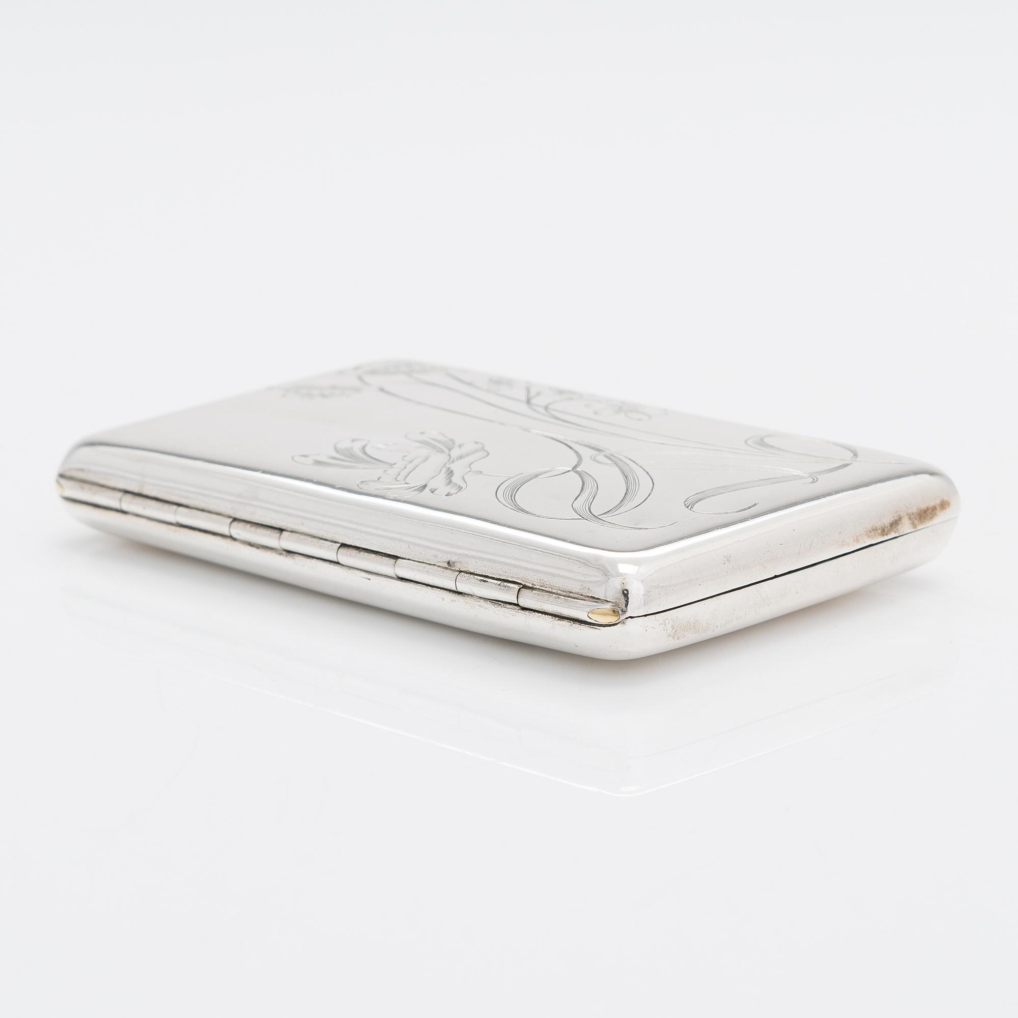 A silver cigarette case, maker's mark of Vasili Sikazev, Moscow 1908-17.