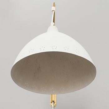 A mid 20th century wall light for Stockmann Orno.