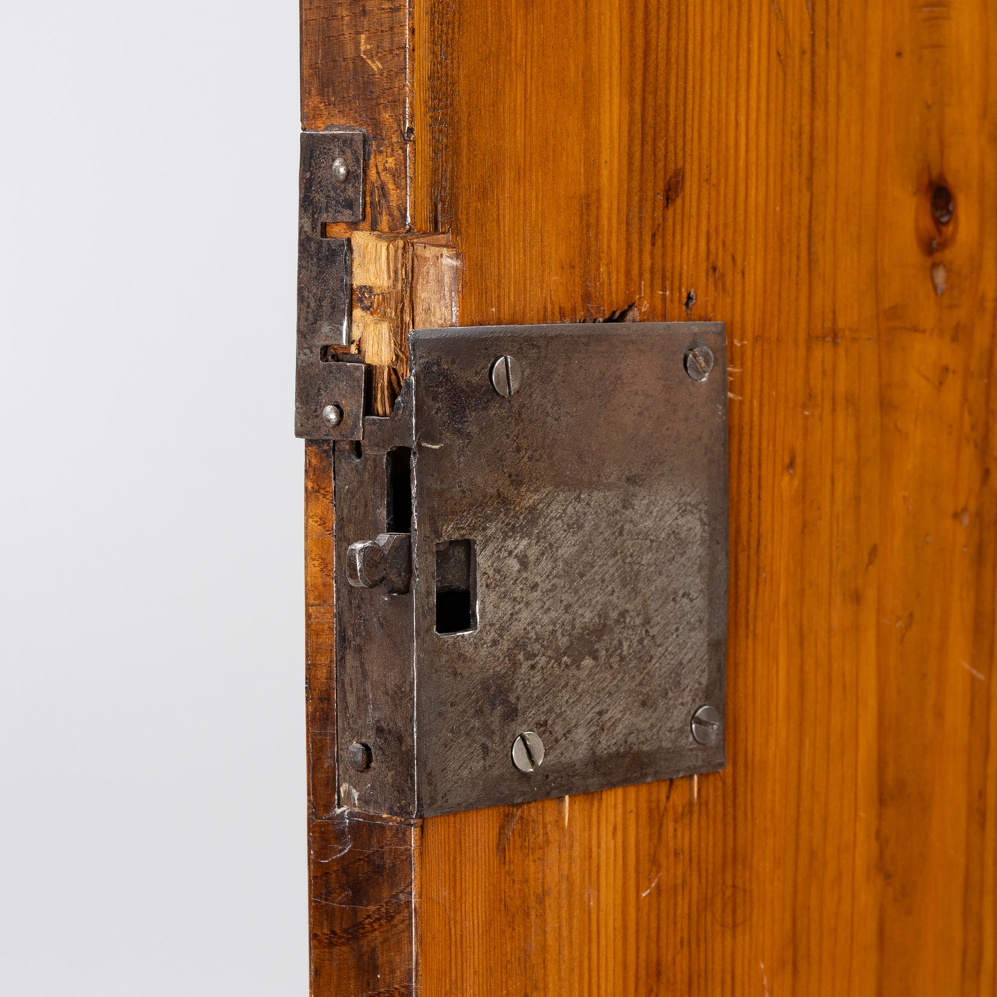 A Swedish rococo burr-alder veneered cabinet, later part 18th century.