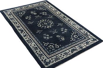 A carpet, China, Antique Finish, ca 250 x 152 cm.
