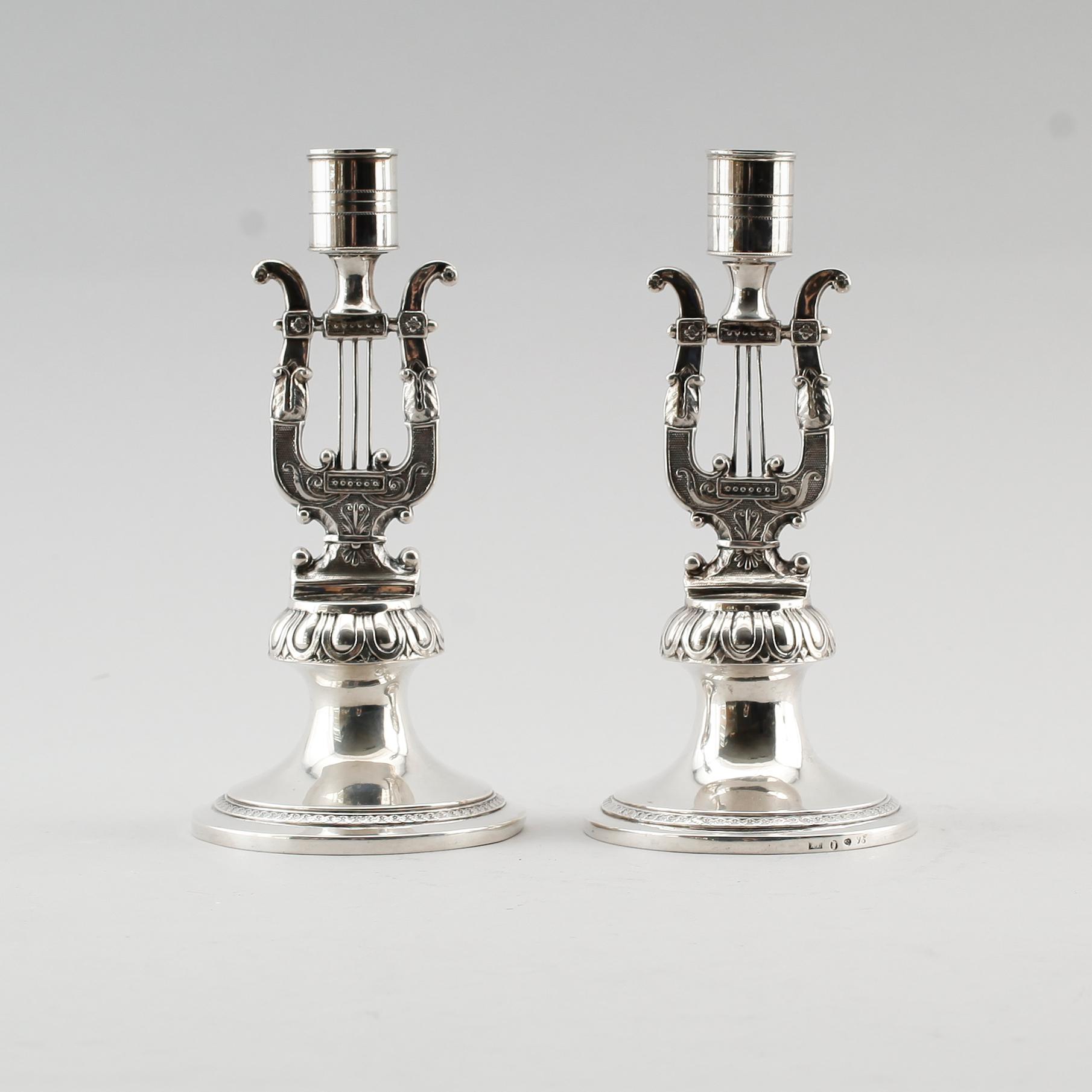 LJUSSTAKAR, 1 par, silver, Anders Lundqvist, Stockholm 1817 och 1829. Vikt ca 344 g.