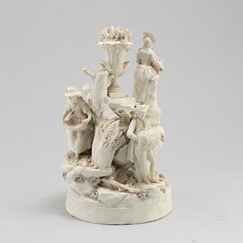 A porcelain figurine group circa 1900.