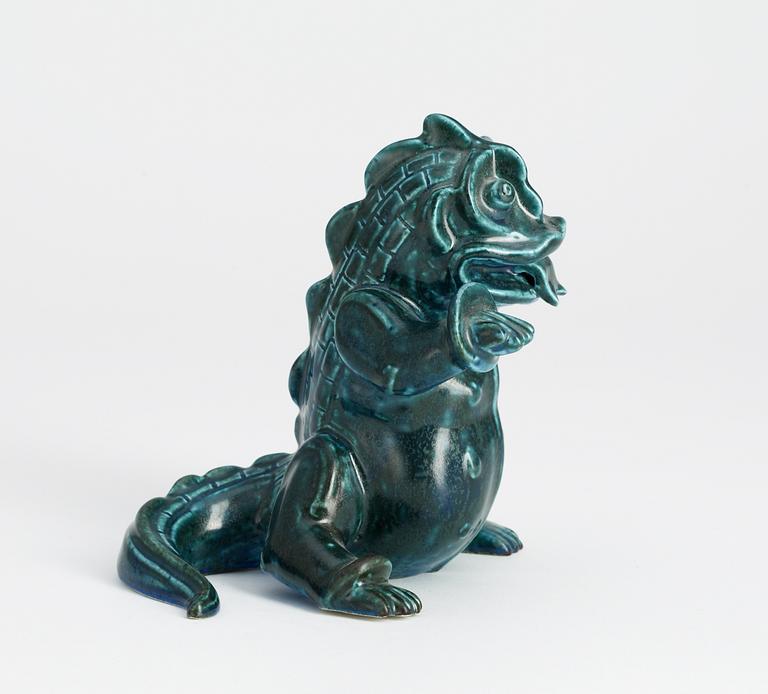 A Wilhelm Kåge stoneware figure of a dragon puppy, Gustavsberg studio circa 1940.