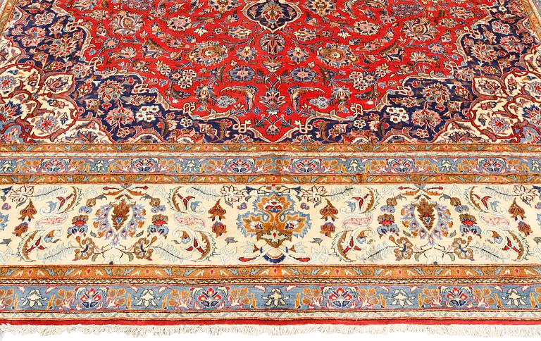 A semi-antique Keshan, central Iran, signed, c 437 x 320 cm.