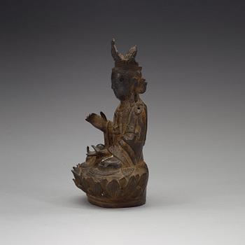 A bronze figure of Guanyin, late Ming dynasty (1368-1644).