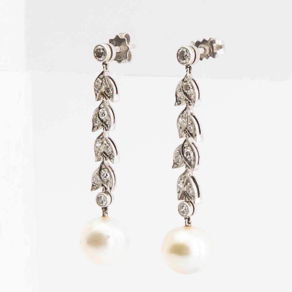 Earrings, a pair, 18k white gold with pearls and diamonds.