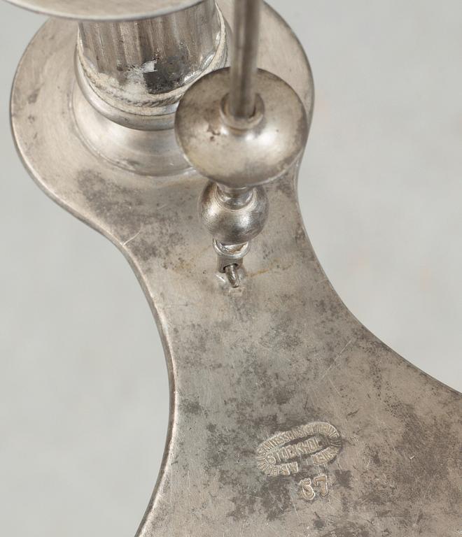 A Ferdinand Boberg four light pewter chandelier, Santesson's tenngjuteri, Stockholm 1905.